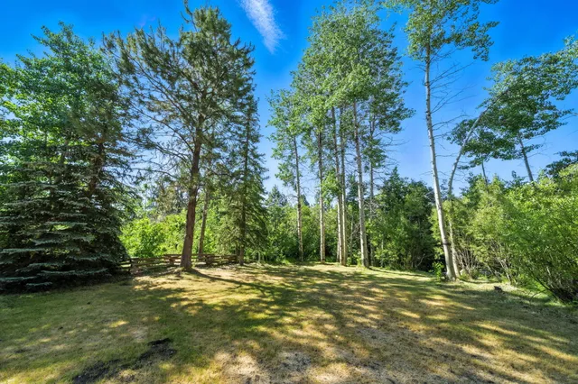 a view of a house with a swimming pool