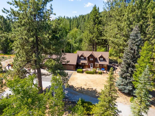 a backyard of a house with lots of green space