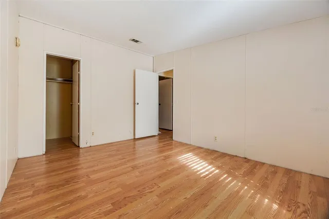 a bathroom with a sink toilet and a mirror