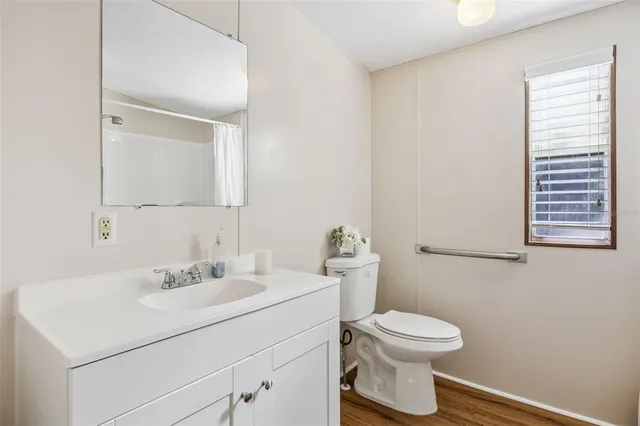 a bedroom with a bed and dresser