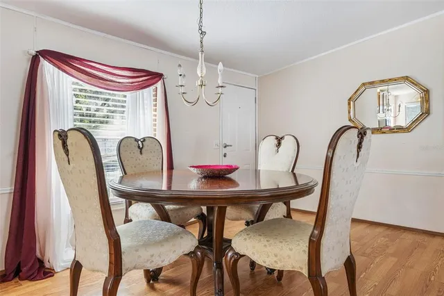 a kitchen with a sink a window and appliances