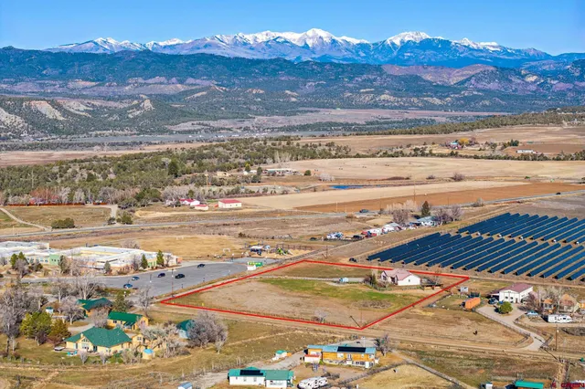 a view of an ocean and a mountain