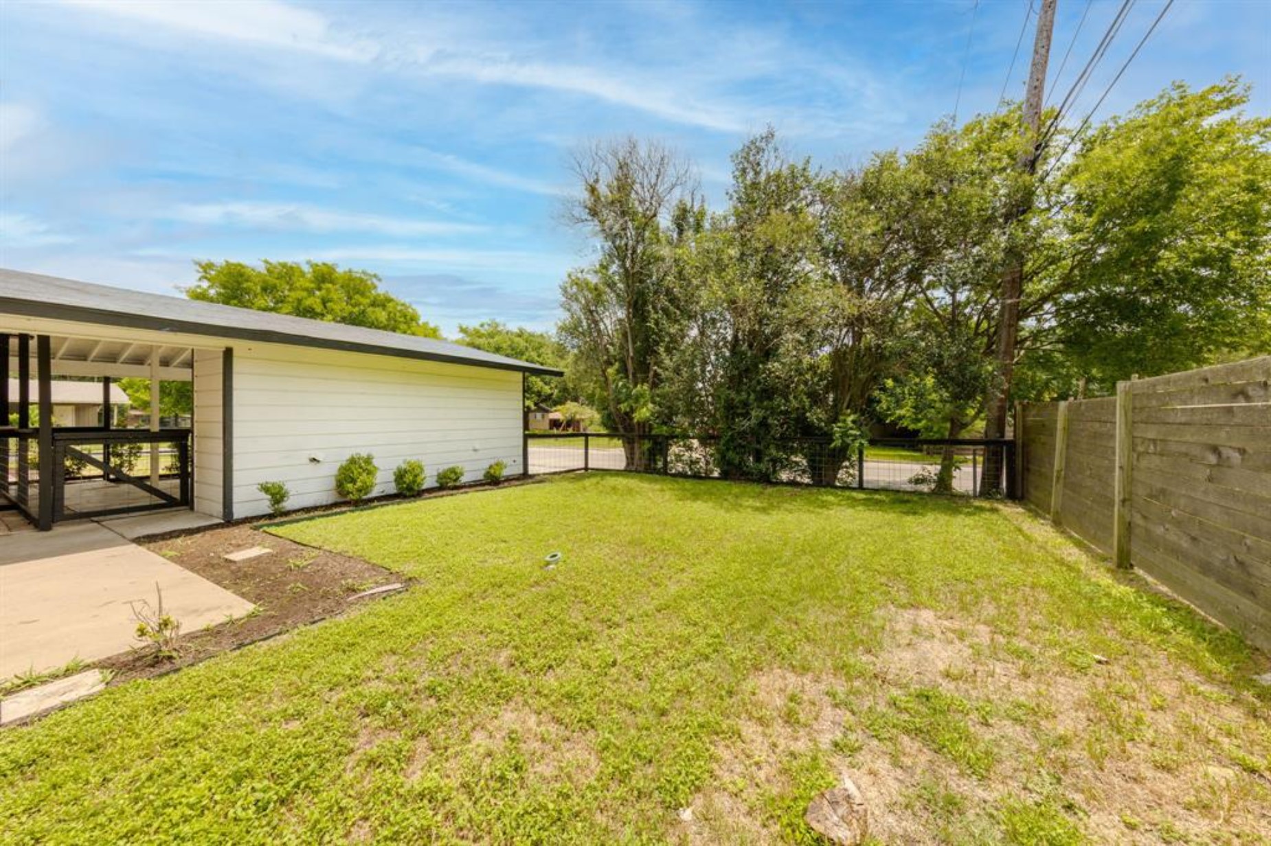 1423 Braes Ridge Drive, Unit B Austin, TX 78723 - Photo 3 of 13 a view of back yard of the house