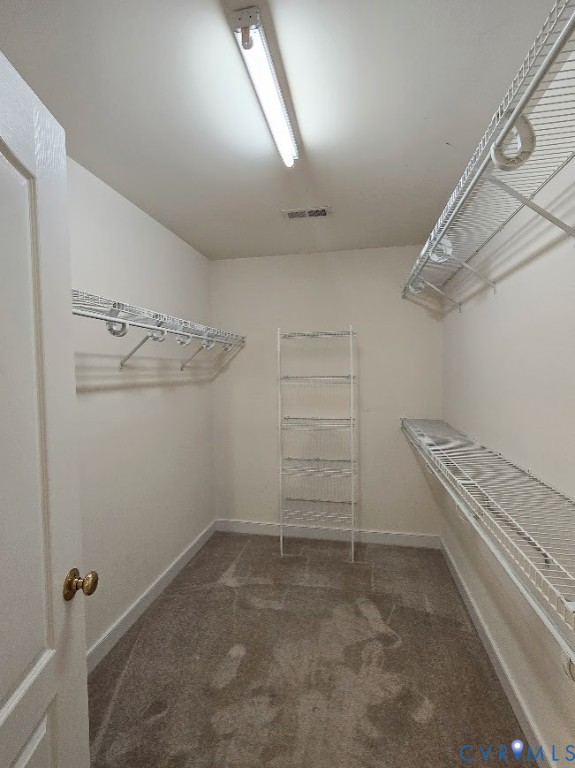 16406 Benmore Road Moseley, VA 23120 - Photo 18 of 32 a view of a room with racks on the wall