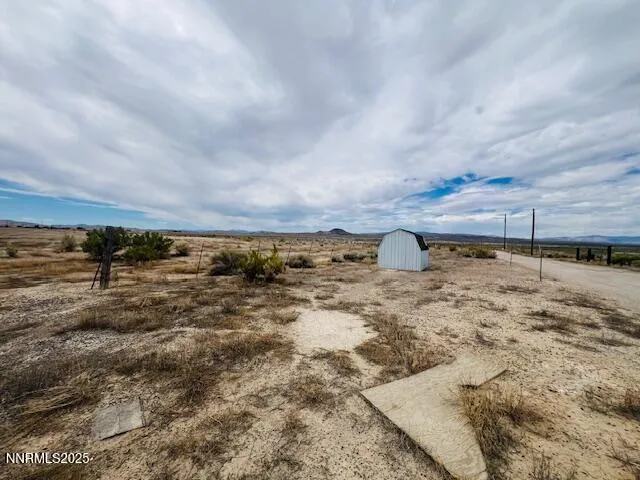 a view of a yard with an outdoor space