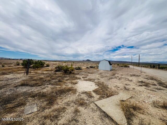 770 Butte View Fallon, NV 89406 - Photo 1 of 8 a view of a yard with an outdoor space