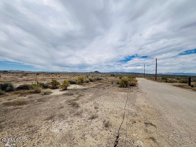 770 Butte View Fallon, NV 89406 - Photo 3 of 8 a view of a dry yard with wooden fence