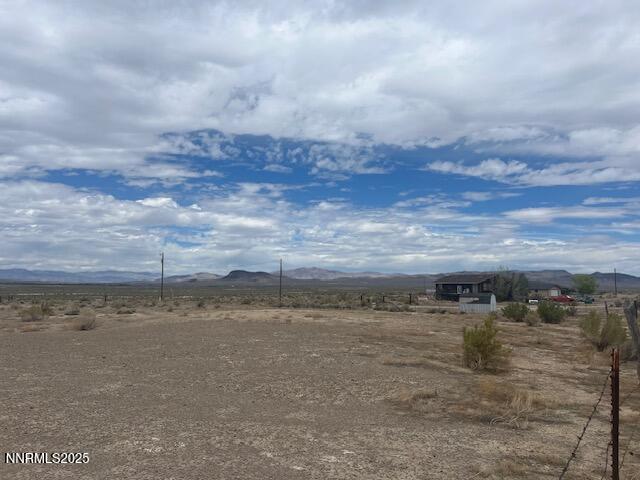 770 Butte View Fallon, NV 89406 - Photo 5 of 8 a view of a lake with a big yard