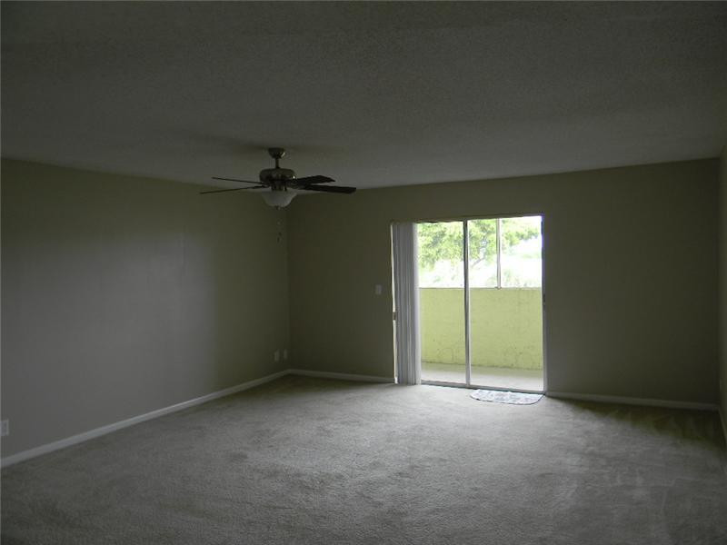 22511 Southwest 66th Avenue, Unit 409 Boca Raton, FL 33428 - Photo 5 of 9 Living Room
