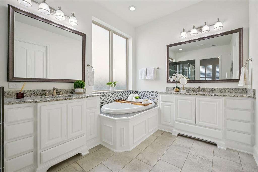 2029 Temperate Drive Allen, TX 75013 - Photo 14 of 40 a bathroom with a sink and a mirror