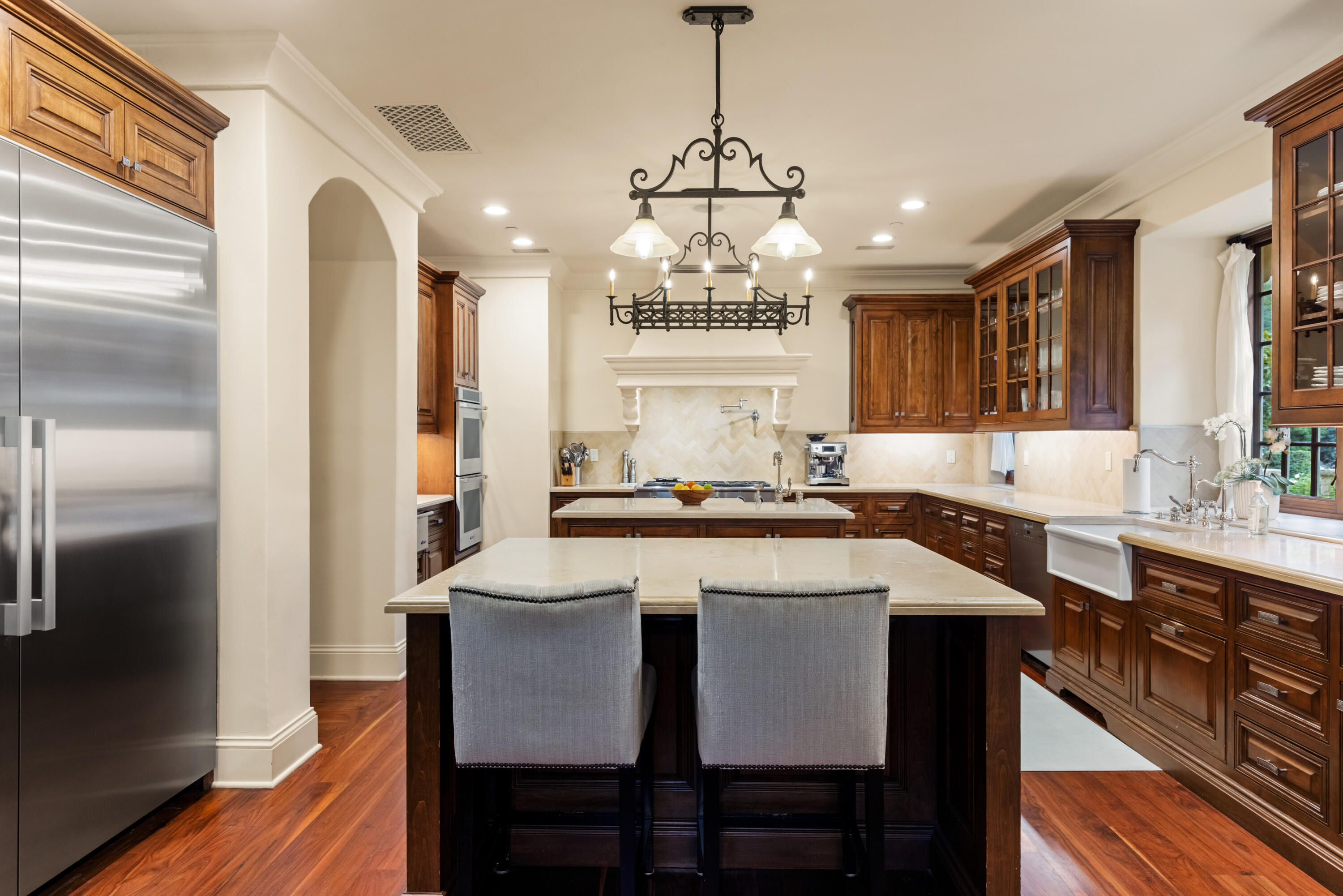 2035 Creekside Road Montecito, CA 93108 - Photo 23 of 60 a large kitchen with a table and chairs