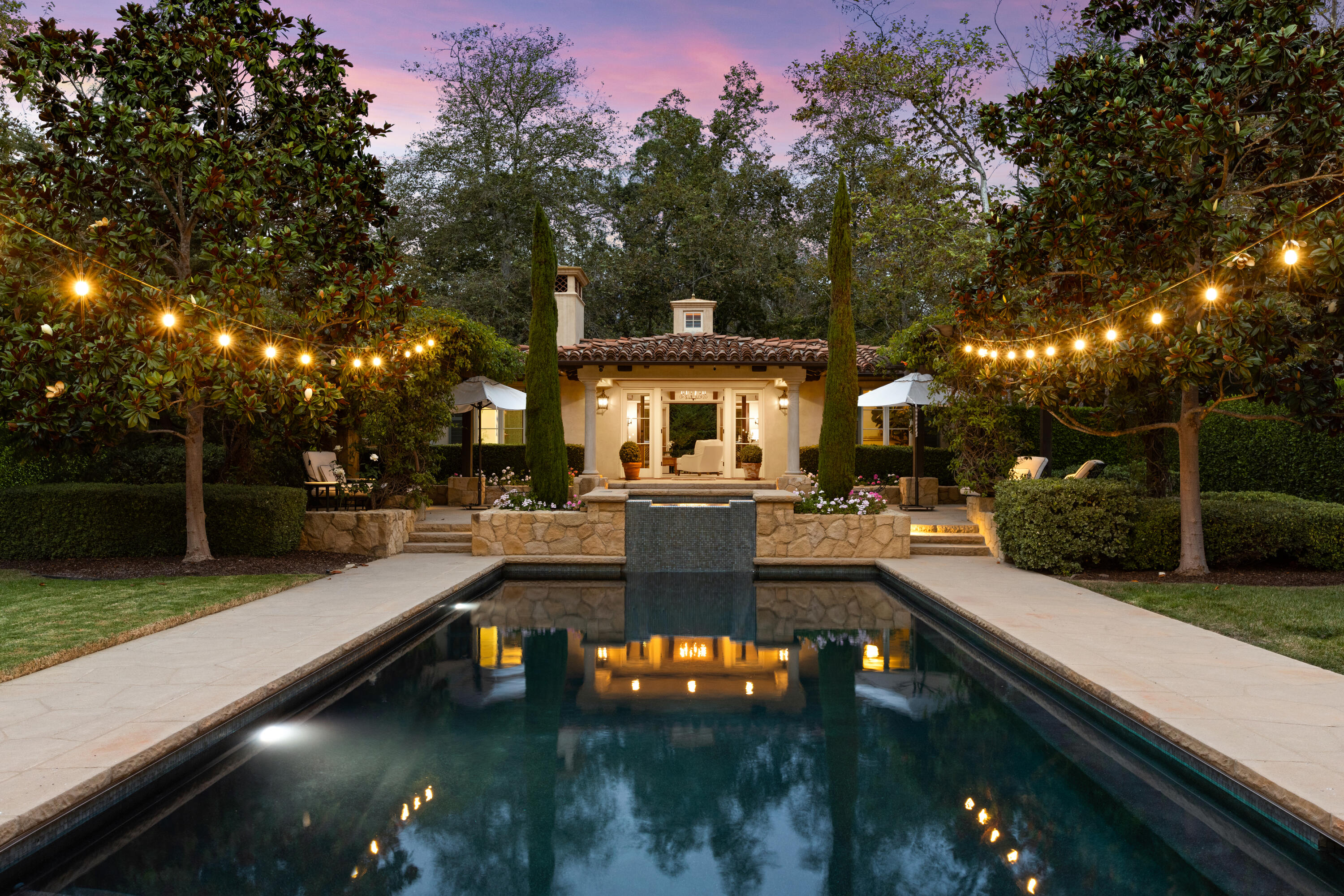 2035 Creekside Road Montecito, CA 93108 - Photo 4 of 60 a view of a swimming pool and lounge chairs