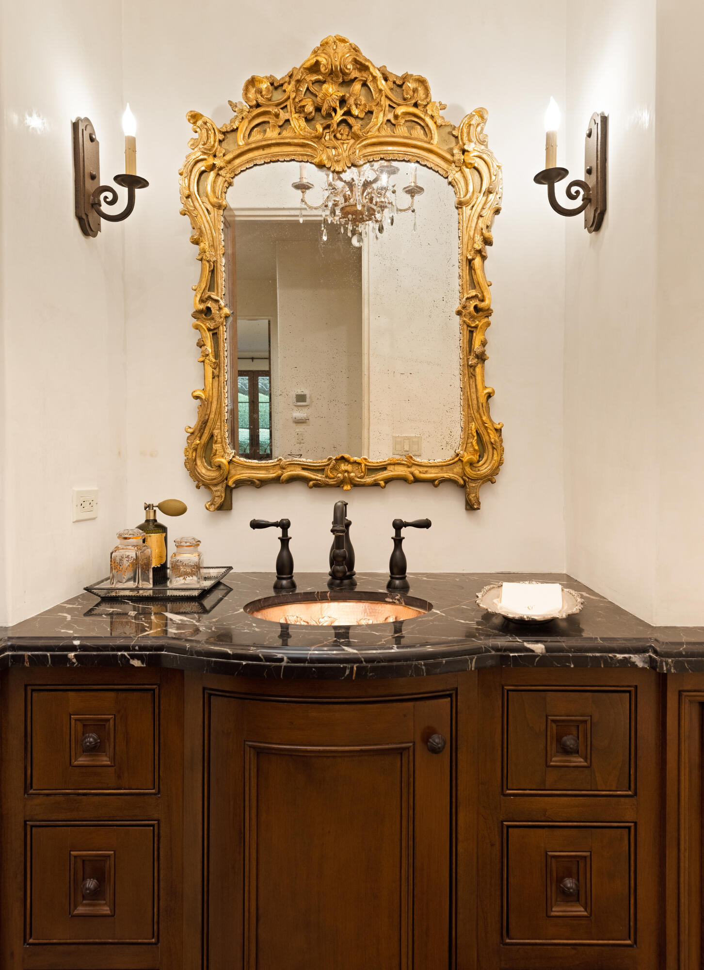 2035 Creekside Road Montecito, CA 93108 - Photo 42 of 60 a bathroom with a sink and a mirror