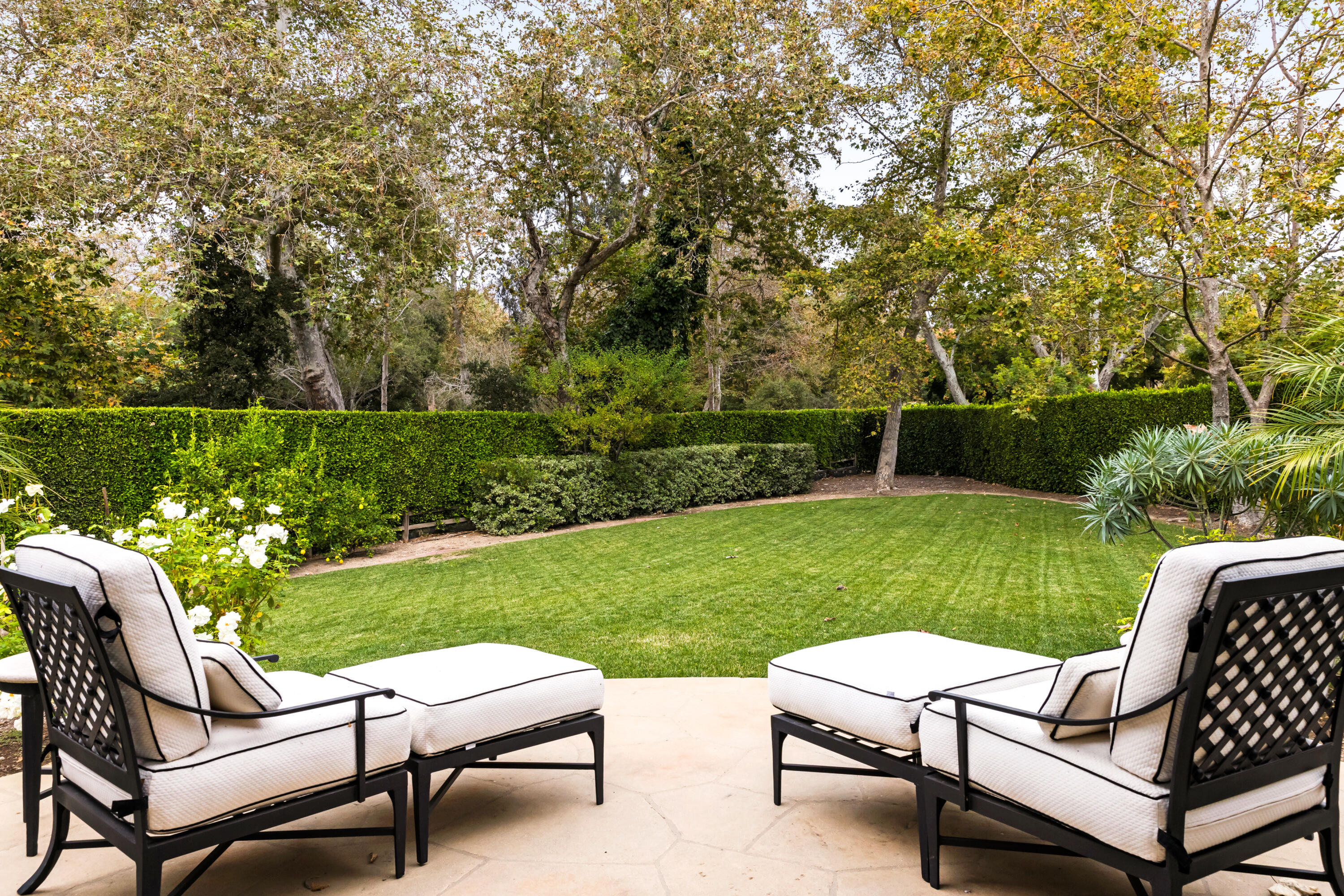 2035 Creekside Road Montecito, CA 93108 - Photo 46 of 60 a view of a two chairs and a table in the yard