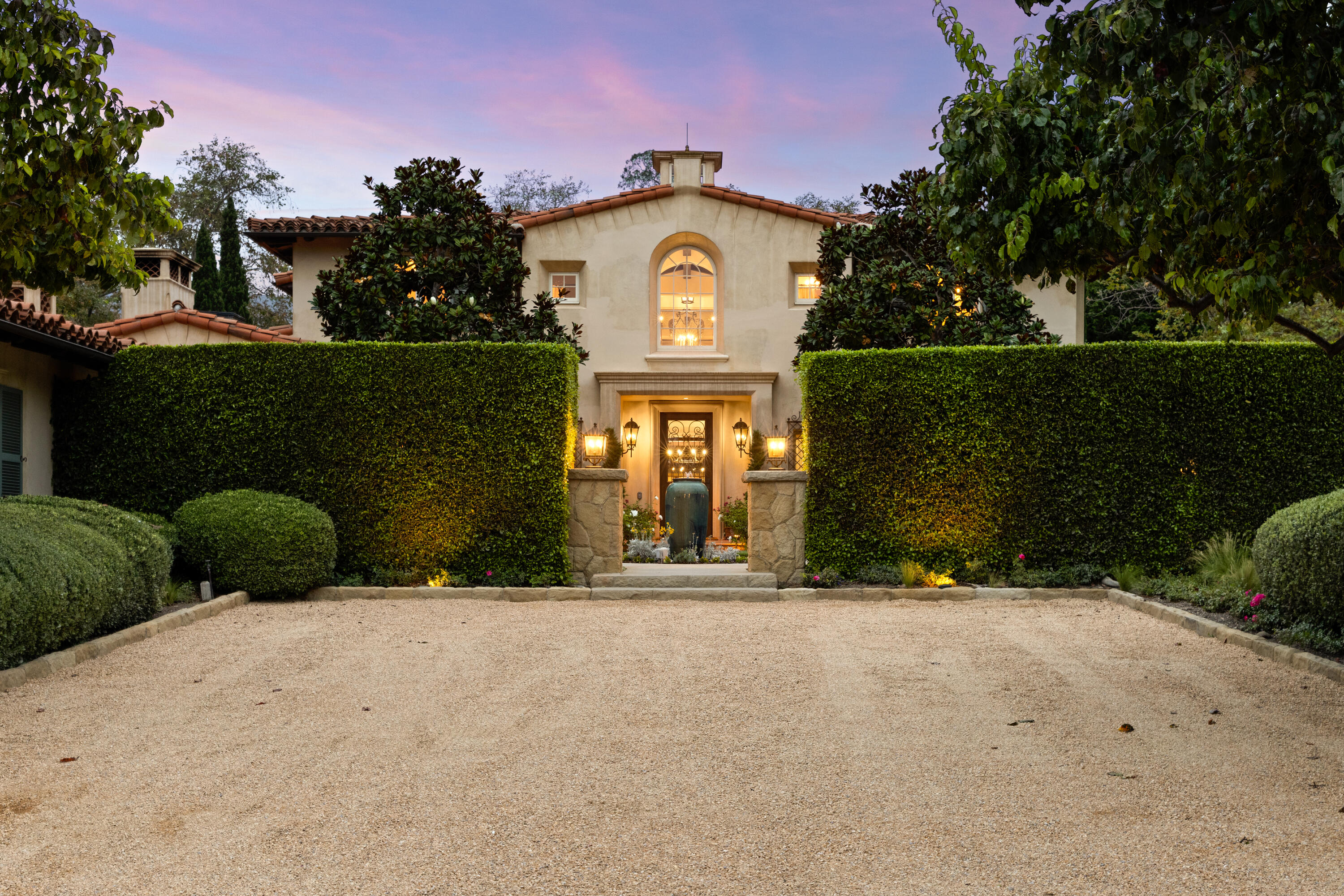 2035 Creekside Road Montecito, CA 93108 - Photo 5 of 60 a front view of a house with a yard