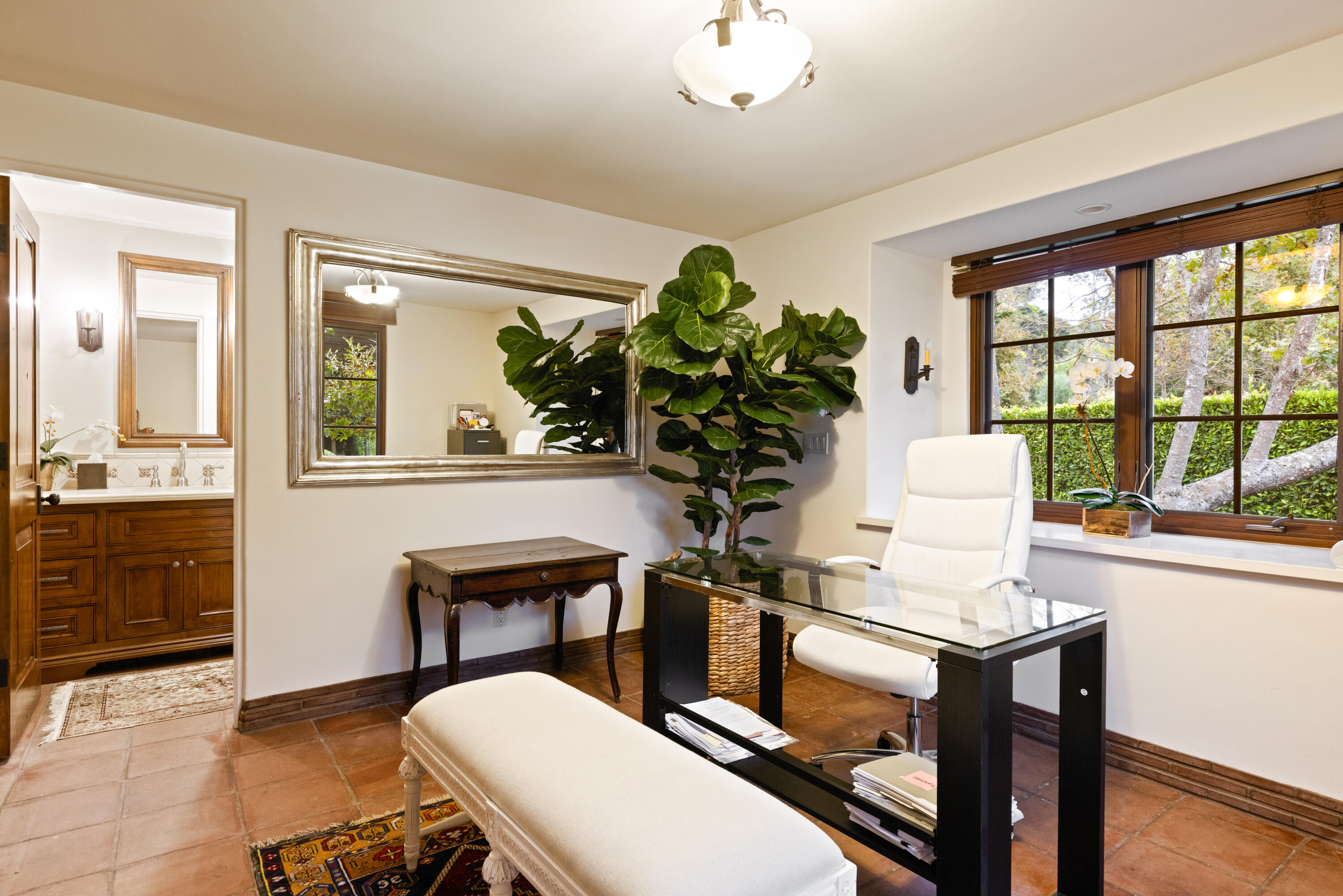 2035 Creekside Road Montecito, CA 93108 - Photo 51 of 60 a workspace with furniture window and wooden floor