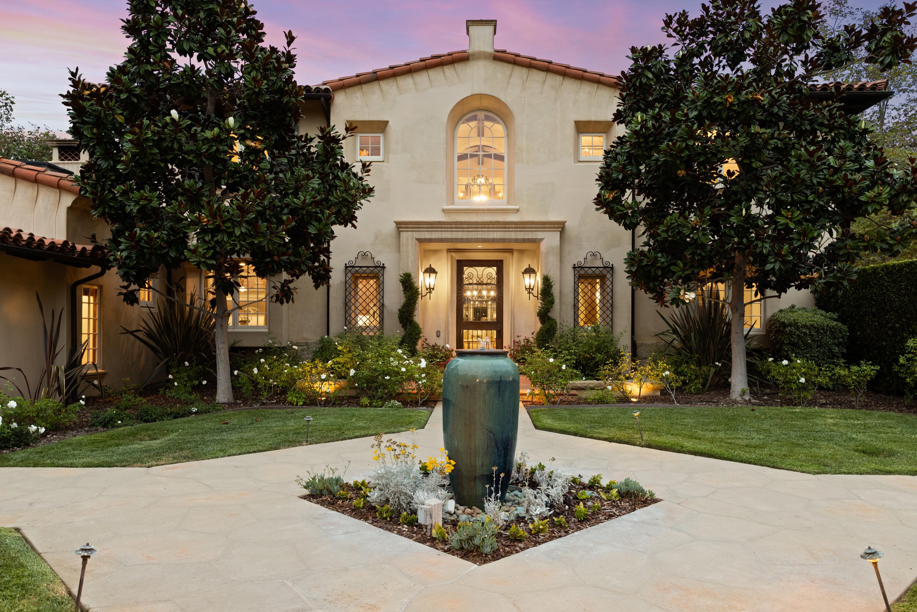 2035 Creekside Road Montecito, CA 93108 - Photo 7 of 60 a front view of a house with a garden