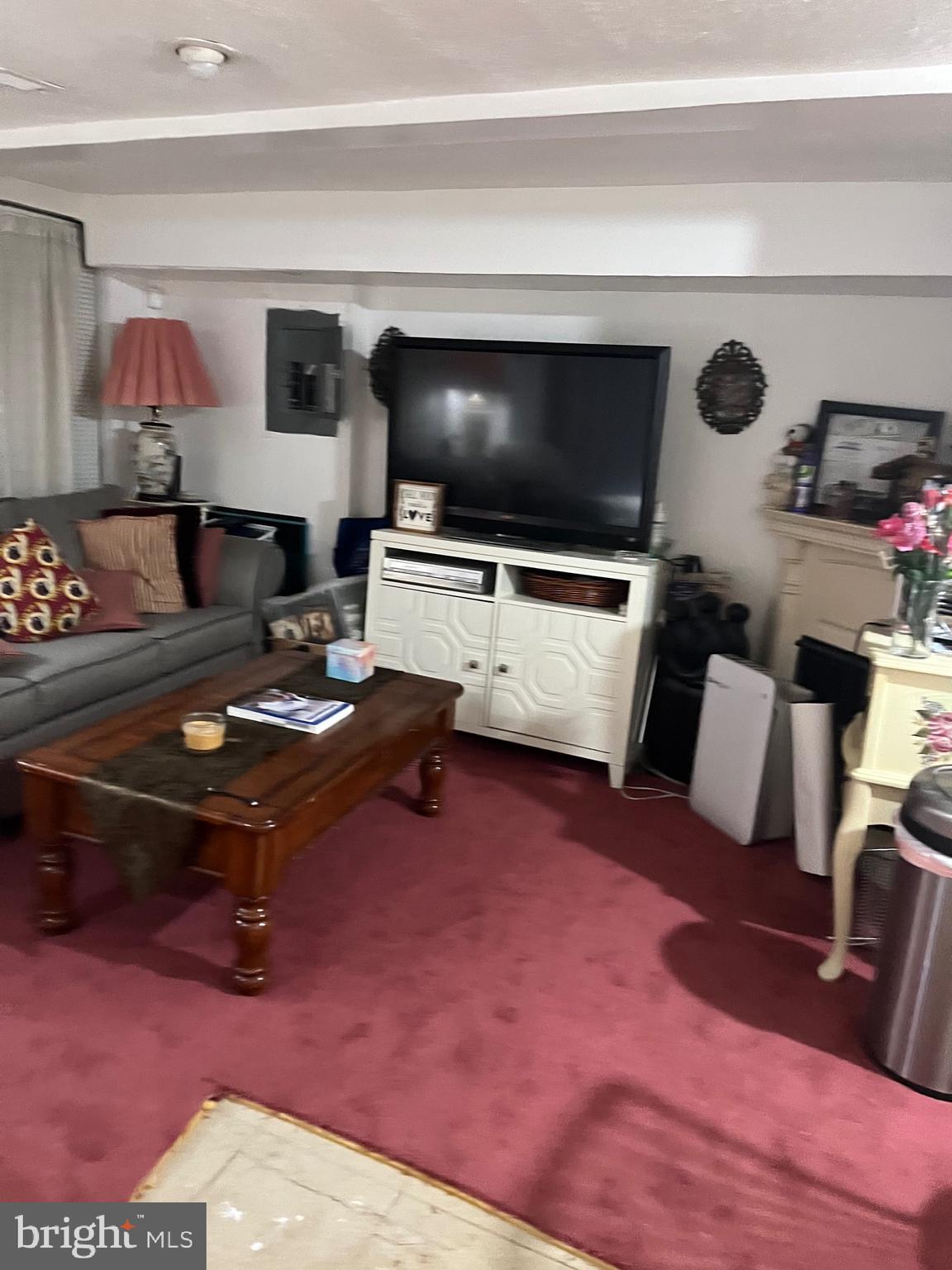 613 K Street Northeast Washington, DC 20002 - Photo 18 of 33 a living room with furniture and a flat screen tv