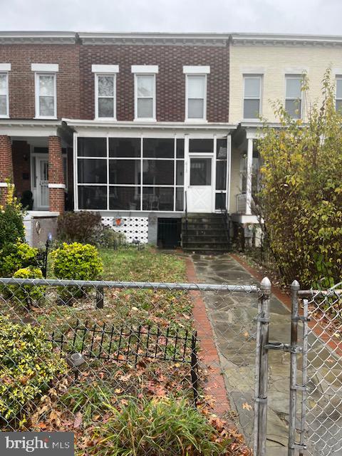613 K Street Northeast Washington, DC 20002 - Photo 2 of 33 a front view of a house with a yard and outdoor seating