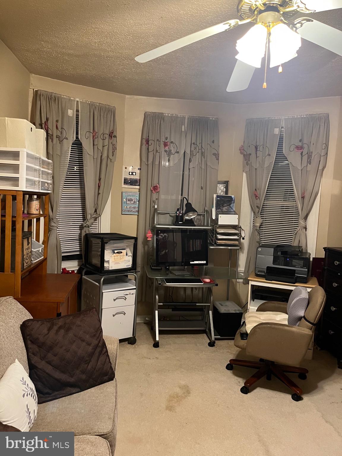 613 K Street Northeast Washington, DC 20002 - Photo 21 of 33 a living room with furniture and a chandelier