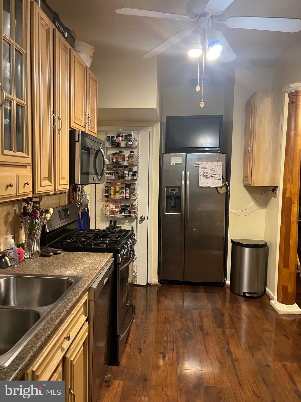 613 K Street Northeast Washington, DC 20002 - Photo 33 of 33 a kitchen with stainless steel appliances granite countertop a sink a stove and a refrigerator