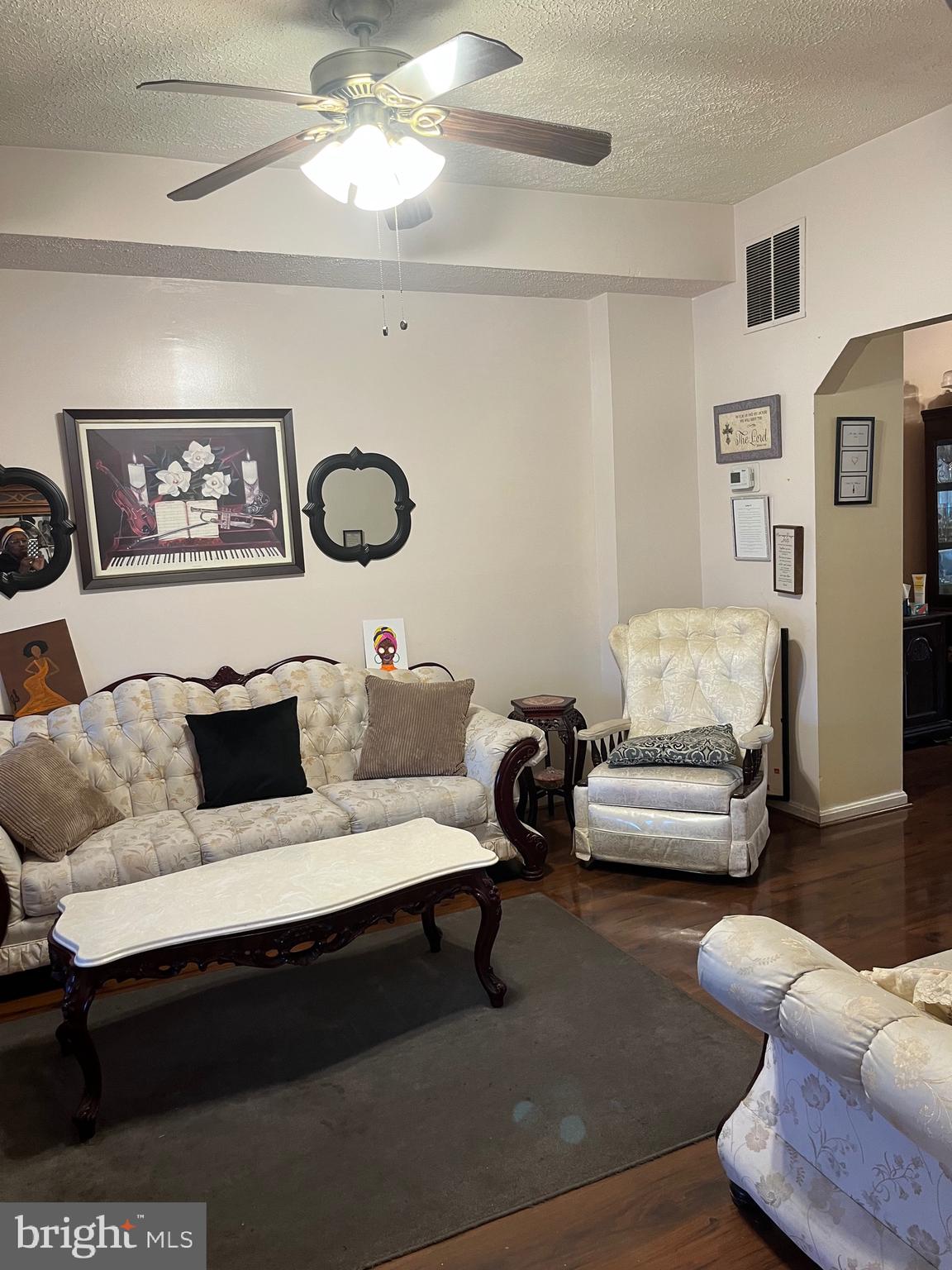 613 K Street Northeast Washington, DC 20002 - Photo 5 of 33 a living room with furniture and a rug