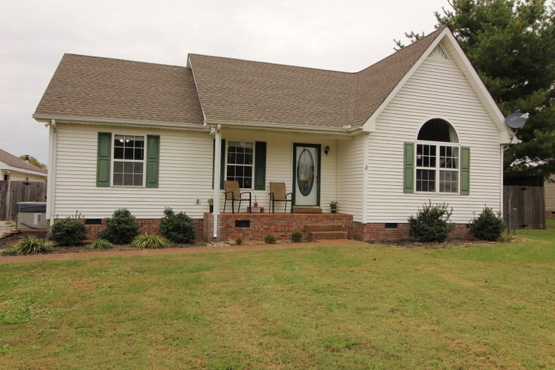 599 Lear Road Portland, TN 37148 - Photo 1 of 25 a front view of a house with a yard