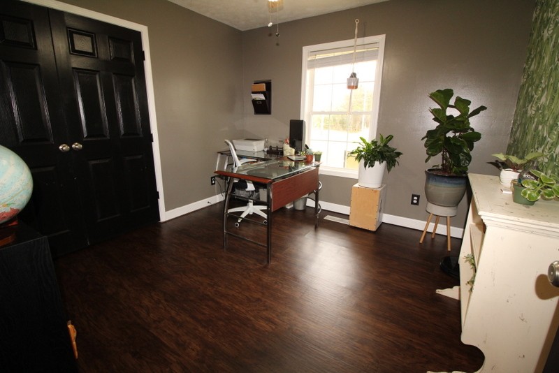 599 Lear Road Portland, TN 37148 - Photo 14 of 25 a living room with furniture and a wooden floor