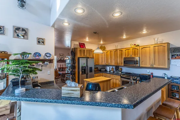 a room with lots of furniture and clutter