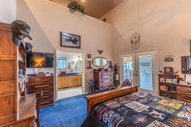 a living room with fireplace furniture and a window