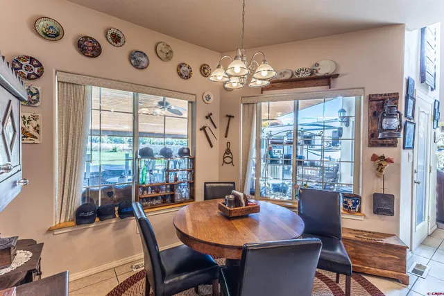 a view of a livingroom with furniture and a fireplace