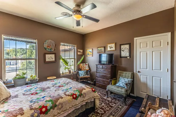 a view of a bedroom bathroom and front door