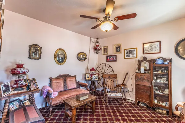 a view of a livingroom with furniture and furniture