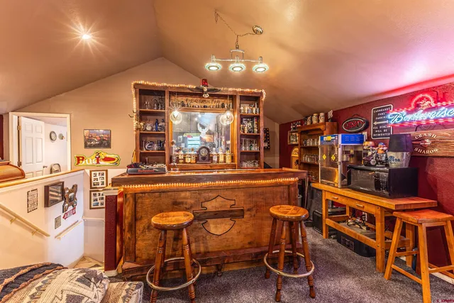 a room with lots of appliances and cabinets