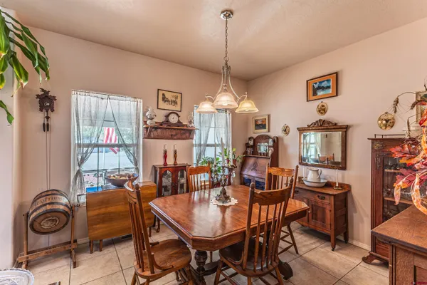 a bedroom with a bed and dresser