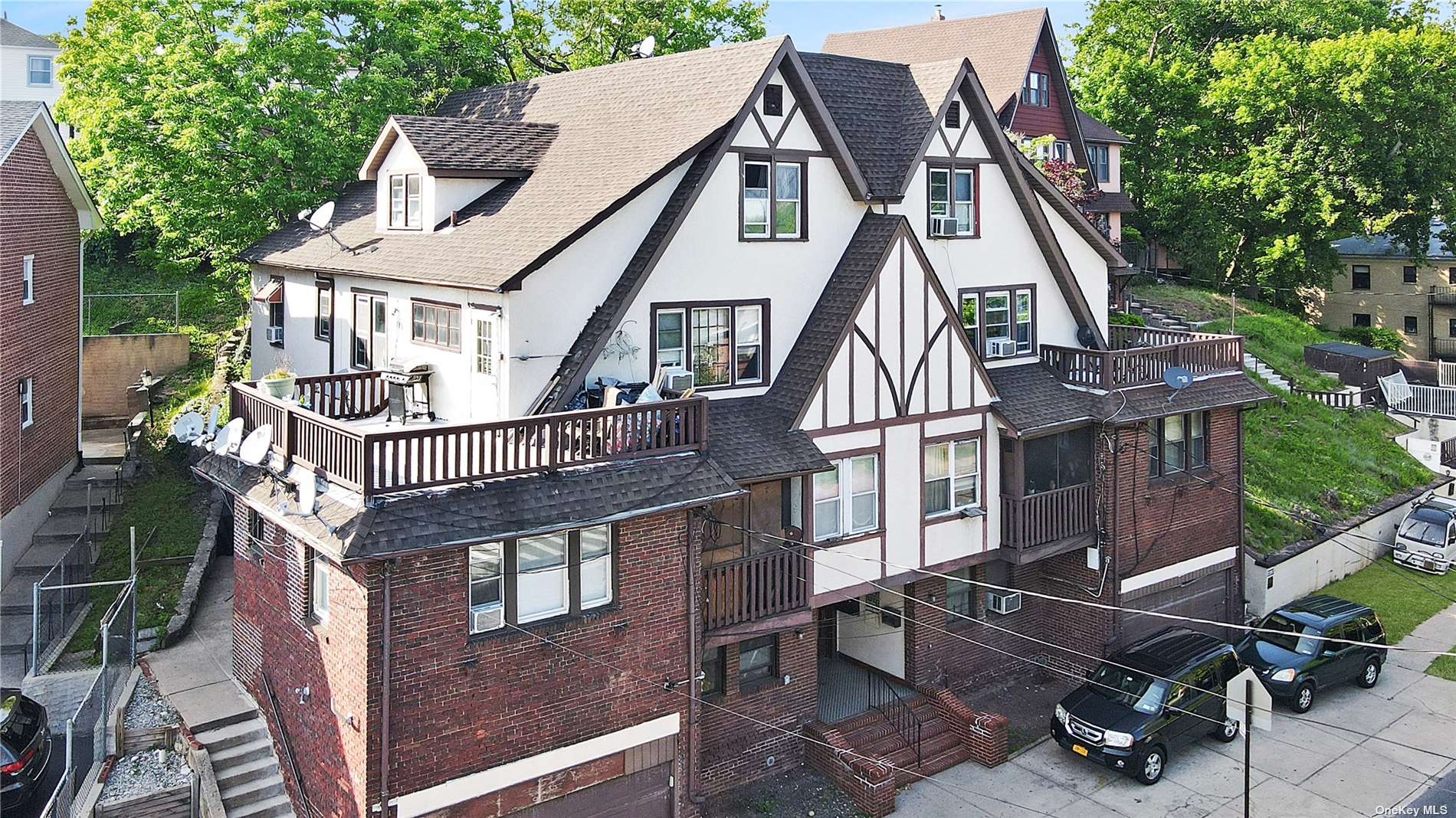 2401-2407 Richmond Road Staten Island, NY 10306 - Photo 5 of 5 a view of balcony with wooden floor and outdoor seating