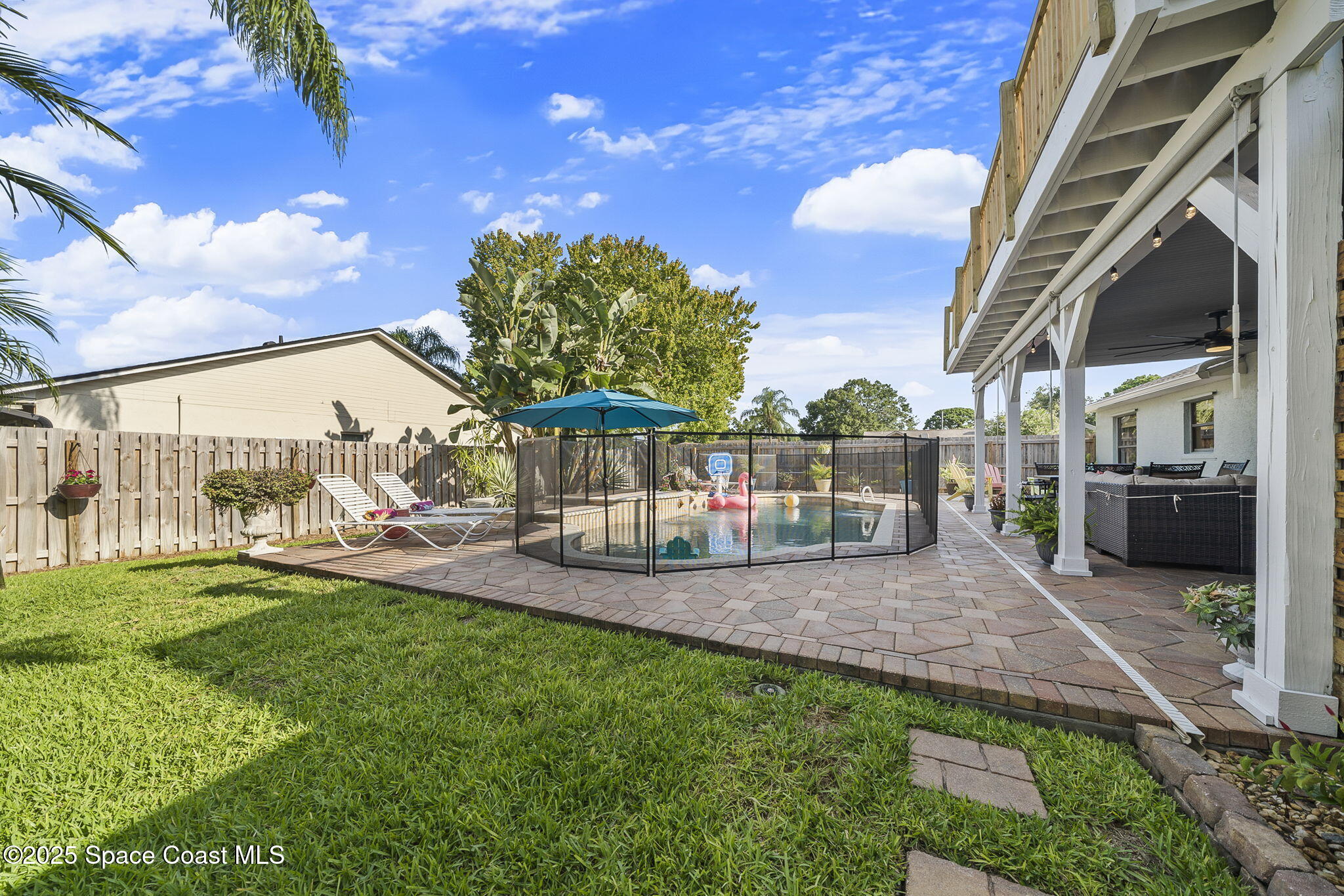 807 Gardener Road Rockledge, FL 32955 - Photo 16 of 66 Pool fence up