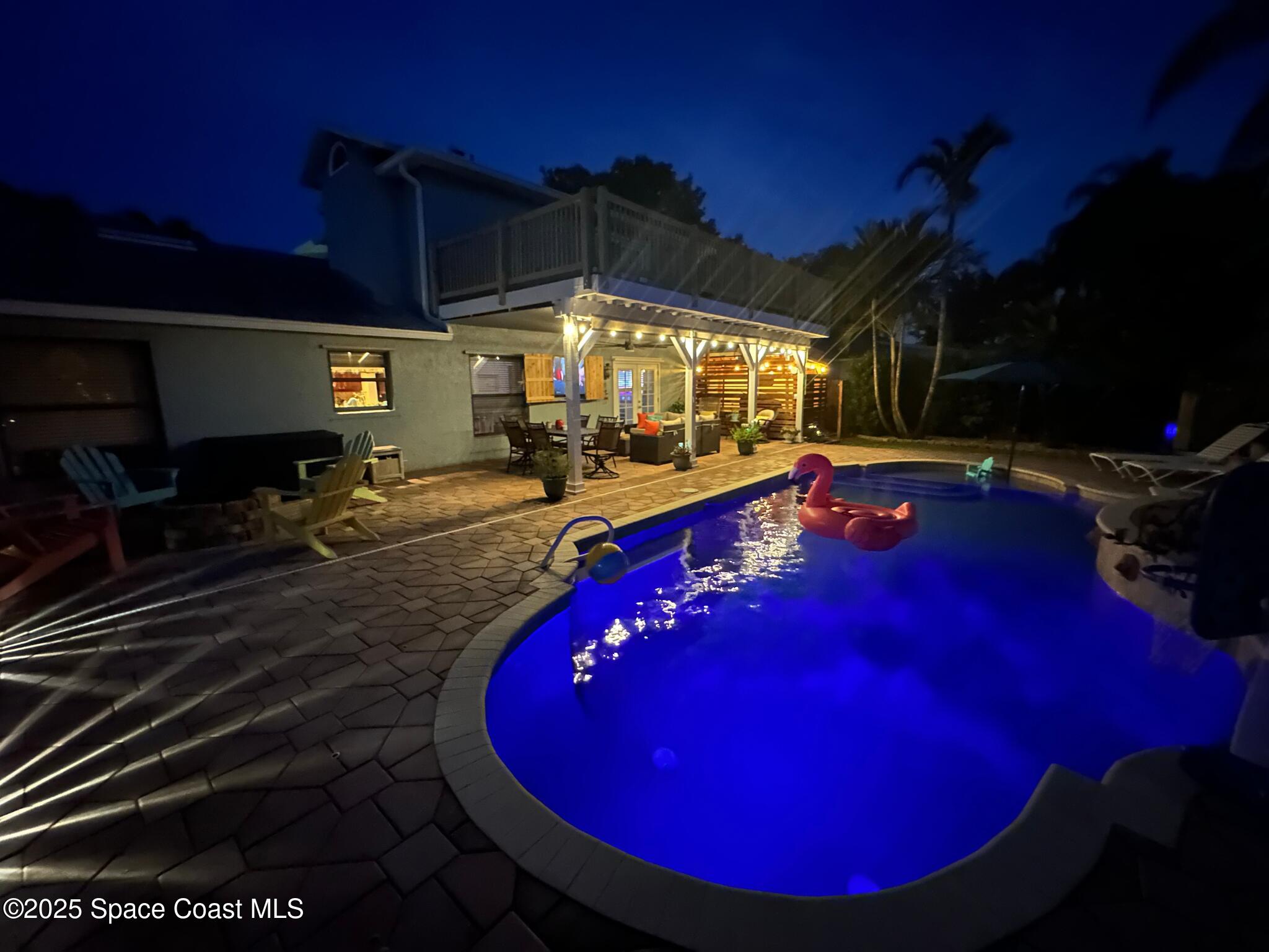 807 Gardener Road Rockledge, FL 32955 - Photo 3 of 66 Pool at night