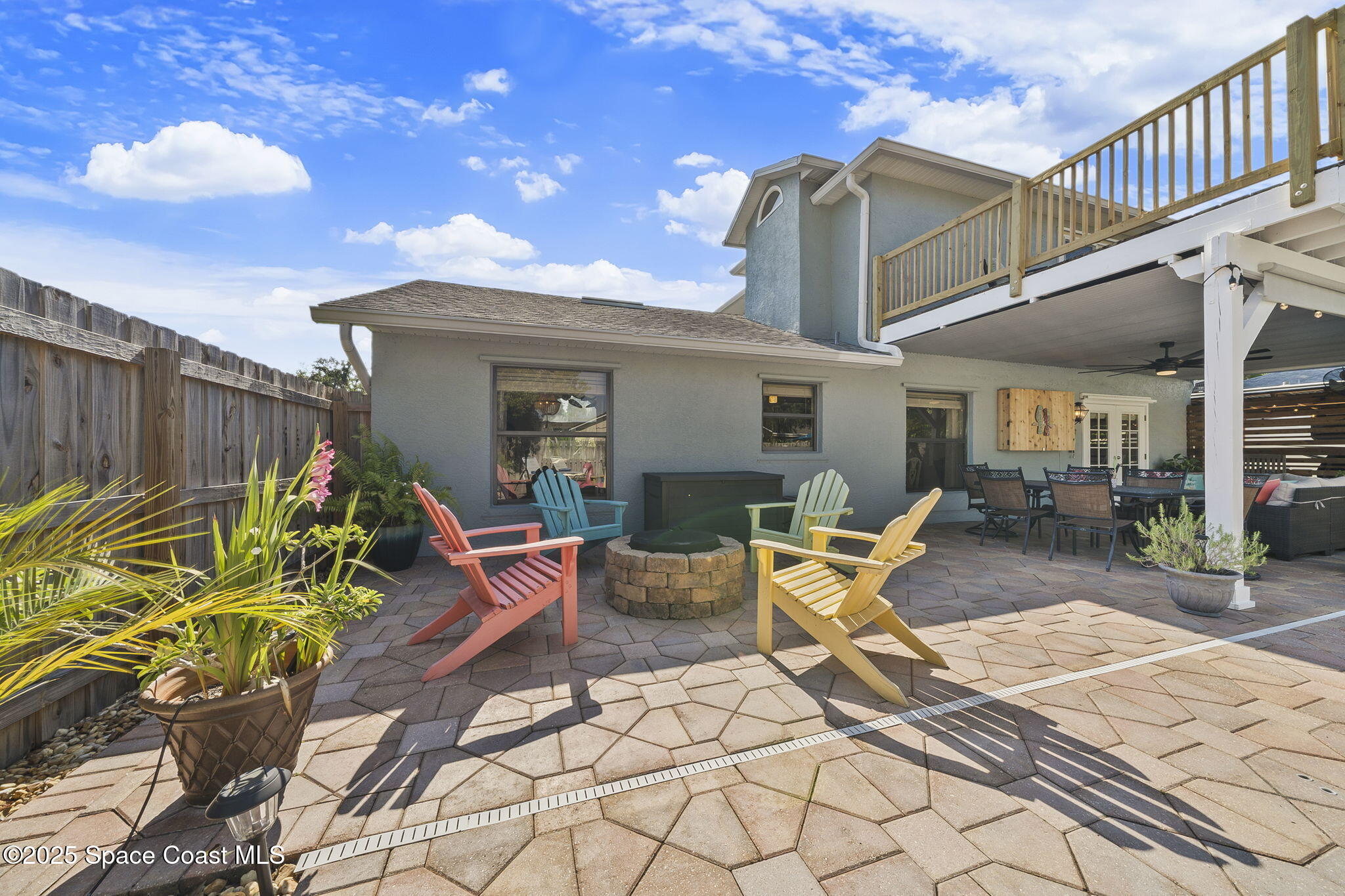 807 Gardener Road Rockledge, FL 32955 - Photo 42 of 66 Fire pit & Back of the house