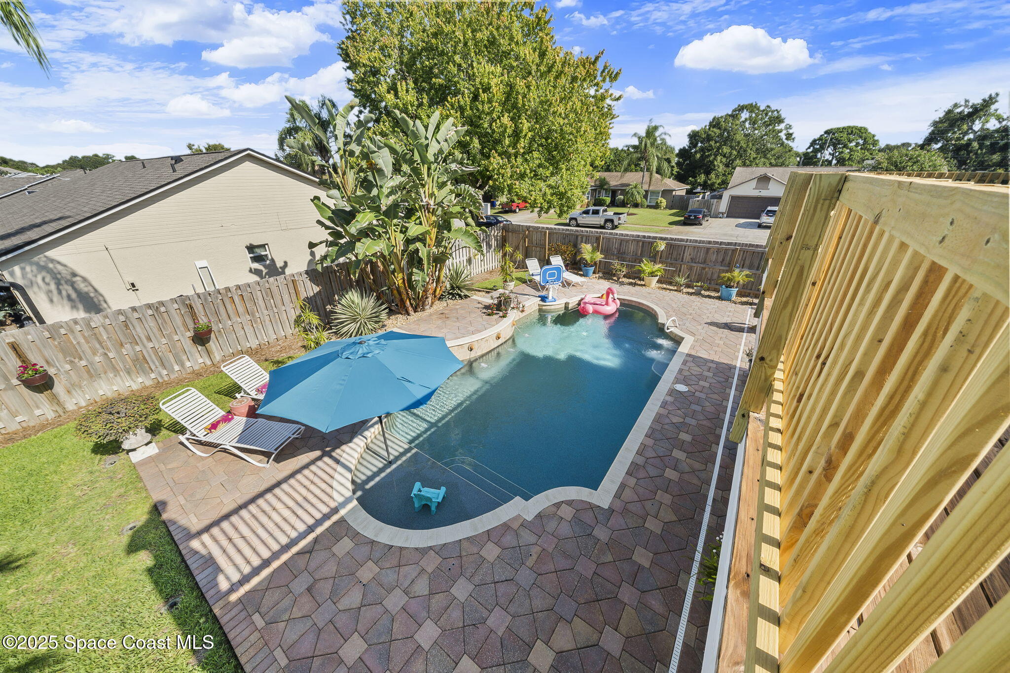 807 Gardener Road Rockledge, FL 32955 - Photo 47 of 66 View to the pool from the deck
