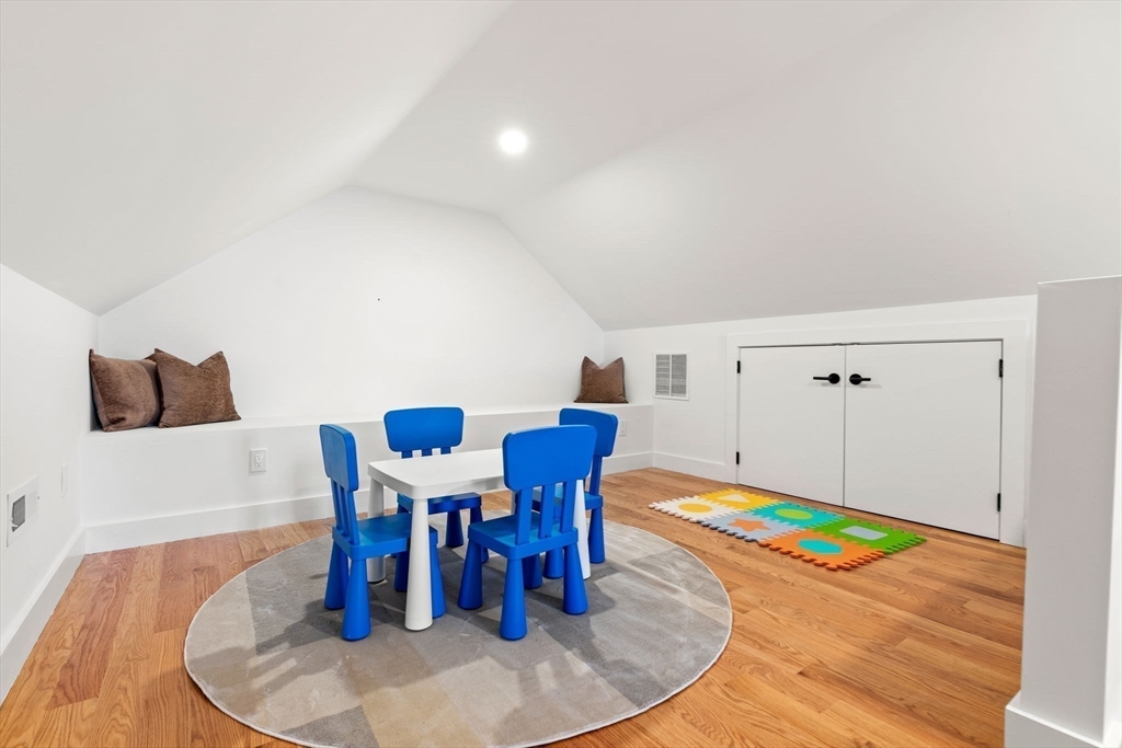 4 Wilbur Street Woburn, MA 01801 - Photo 28 of 39 a dining room with furniture and wooden floor