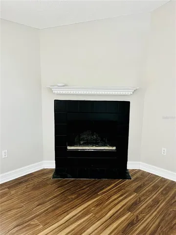 a living room with a fireplace