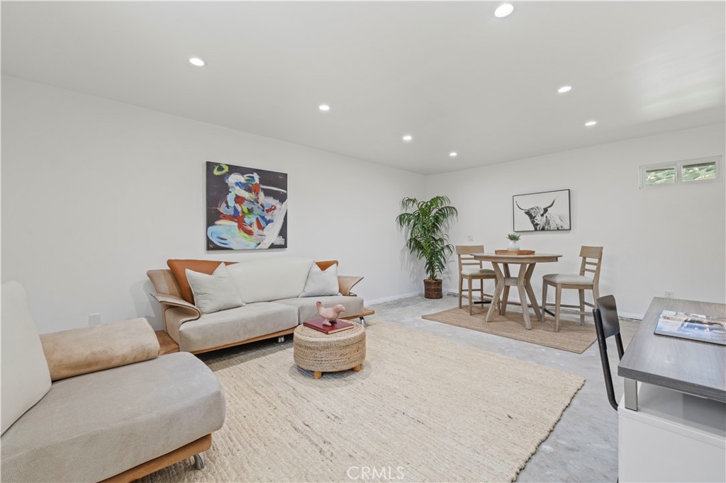 120 Rollins Road Chatsworth, CA 91311 - Photo 17 of 25 a living room with furniture and a potted plant