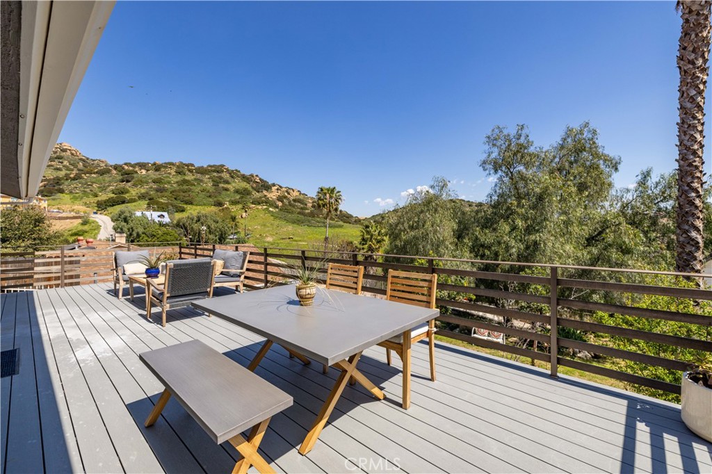 120 Rollins Road Chatsworth, CA 91311 - Photo 19 of 25 a view of a terrace with furniture