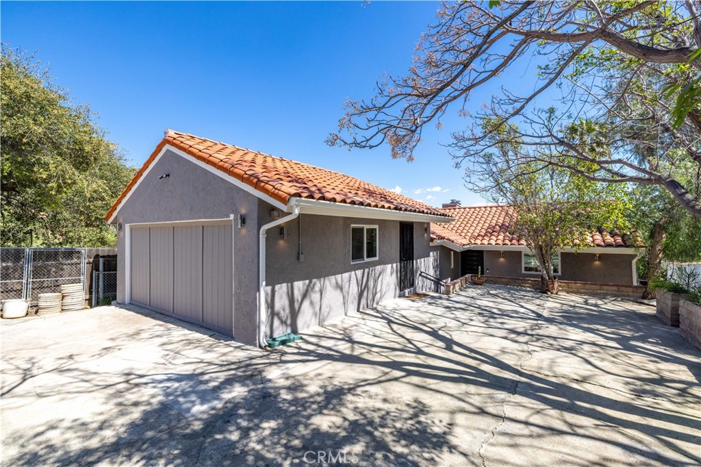 120 Rollins Road Chatsworth, CA 91311 - Photo 21 of 25 a view of a house with a patio