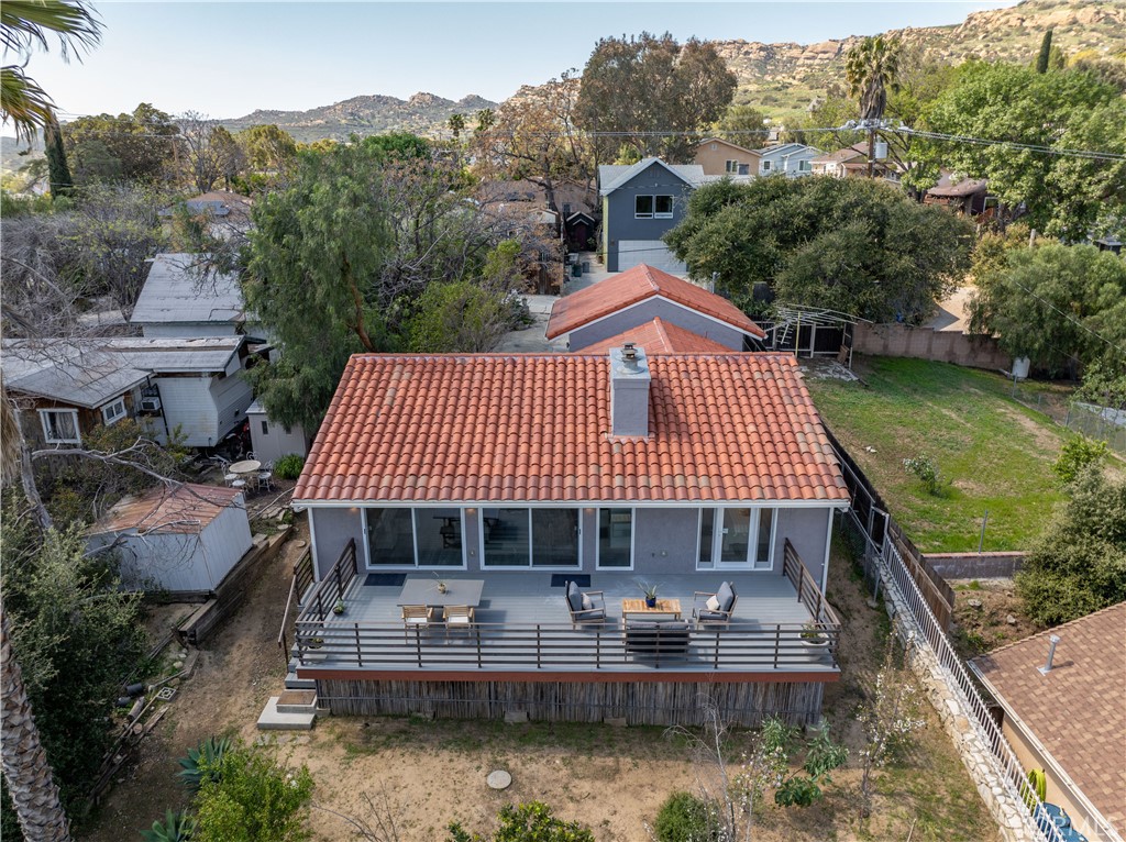 120 Rollins Road Chatsworth, CA 91311 - Photo 24 of 25 a aerial view of a house with swimming pool table and chairs