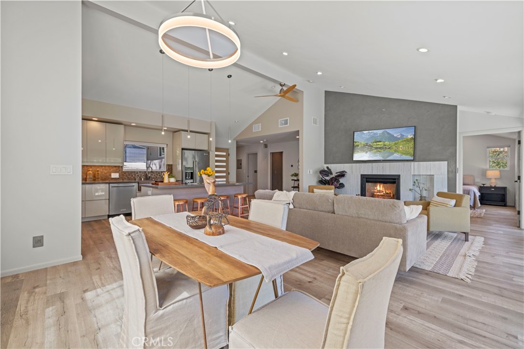 120 Rollins Road Chatsworth, CA 91311 - Photo 6 of 25 a living room with fireplace furniture and a wooden floor