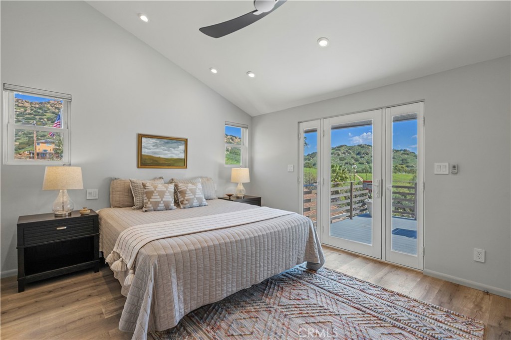 120 Rollins Road Chatsworth, CA 91311 - Photo 7 of 25 a bedroom with a large bed and a window