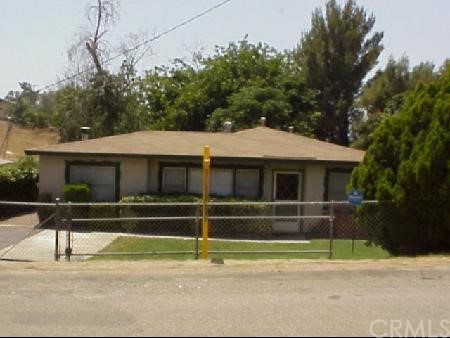 5259 Dunwood Street Riverside, CA 92509 - Photo 1 of 1 a front view of a house with a garage