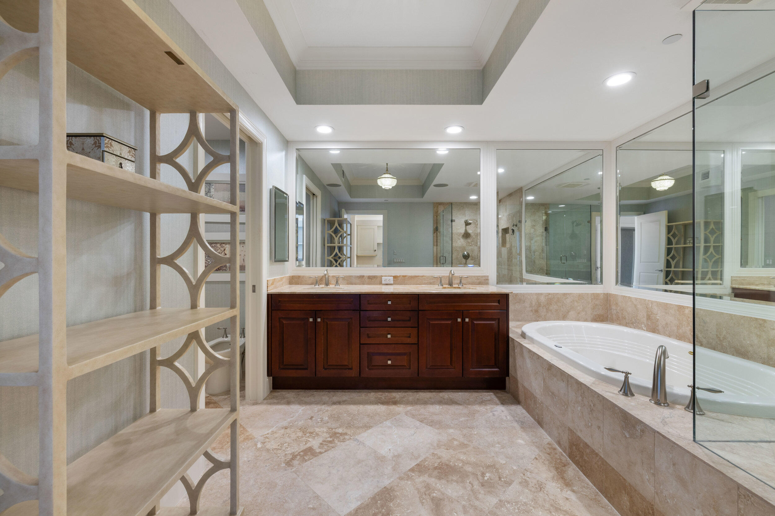 5050 North Ocean Drive, Unit 1502 Singer Island, FL 33404 - Photo 20 of 56 a spacious bathroom with a tub sink shower and mirror